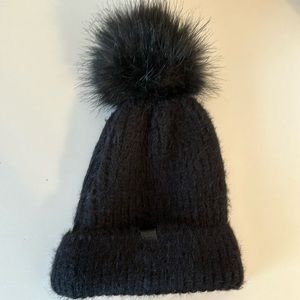 Black winter knit hat with Pom Pom